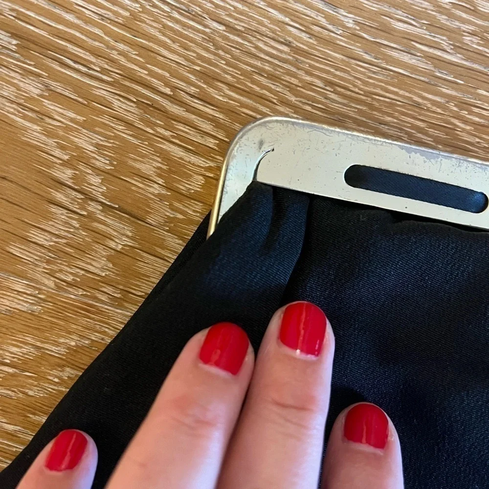 Fabric vintage clutch with a metal closure